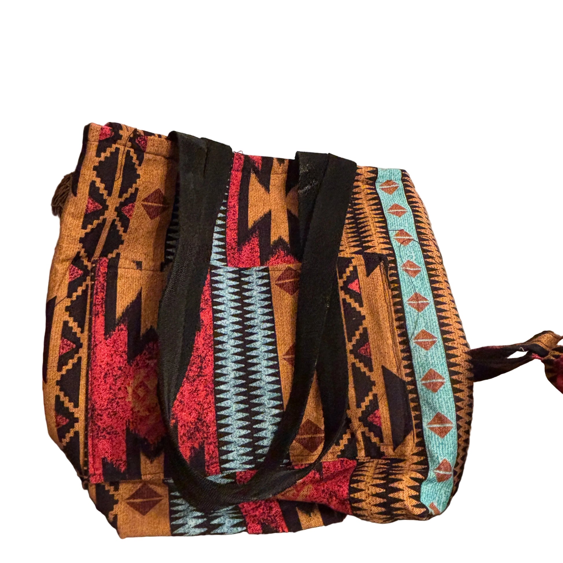 Patterned bag with colorful design on a textured surface