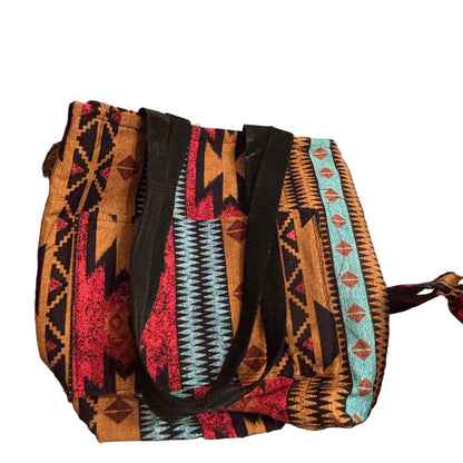 Patterned bag with colorful design on a textured surface